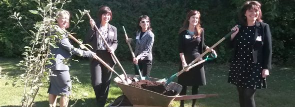 MP Julie Dabrusin, Minister Ginette Petitpas Taylor, CPHO Dr. Theresa Tam,  Kim Herrington from Whole Kids Foundation,  and Joanne Bays from F2CC planting a tree at Norman Johnston Alternate School to celebrate Just Dig In.