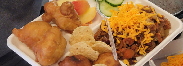A plate of food including bannock and chili